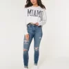 Curvy High-Rise Ripped Medium Wash Super Skinny Jeans