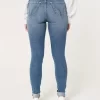 Curvy High-Rise Ripped Medium Wash Super Skinny Jeans
