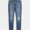 Curvy High-Rise Ripped Medium Wash Super Skinny Jeans