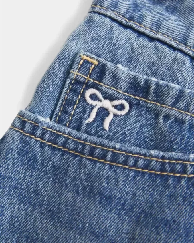Curvy Low-Rise Embroidered Bow Denim Mini Skort