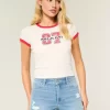 High-Rise Ripped Medium Light Wash Denim Shortie Shorts