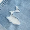 High-Rise Ripped Medium Light Wash Denim Shortie Shorts