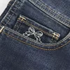 Low-Rise Dark Wash Embroidered Denim Shortie Shorts
