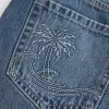 Low-Rise Embroidered Denim Mini Skort