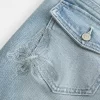Low-Rise Medium Wash Embroidered Butterfly Bootcut Jeans
