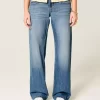 Low-Rise Medium Wash Studded Hearts Baggy Jeans