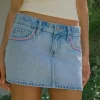 Low-Rise Pink Embroidered Light Wash Denim Mini Skort