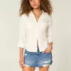 Low-Rise Ripped Dark Wash Denim Mini Skort