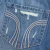 Low-Rise Ripped Dark Wash Denim Mini Skort