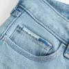 Low-Rise Ripped Light Wash Embroidered Bootcut Jeans