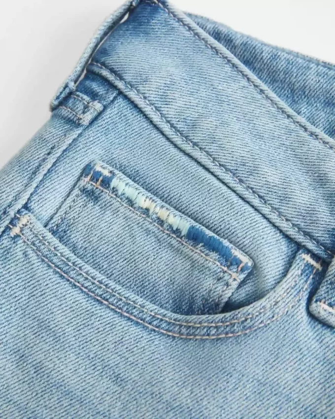 Low-Rise Ripped Light Wash Embroidered Bootcut Jeans