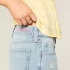Low-Rise Ripped Light Wash Graphic Baggy Jeans