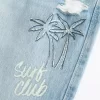 Low-Rise Ripped Light Wash Graphic Baggy Jeans