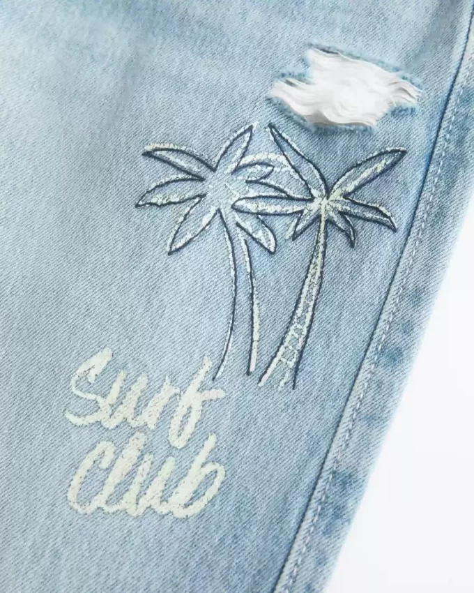 Low-Rise Ripped Light Wash Graphic Baggy Jeans