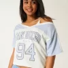Oversized Off-the-Shoulder Varsity San Diego Graphic Tee Oversized Off-the-Shoulder Varsity San Diego Graphic Tee