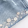 Ultra Low-Rise Embroidered Denim Mini Shorts