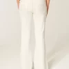 Ultra Low-Rise White Embroidered Pocket Flare Jeans